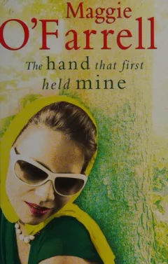 The hand that first held mine